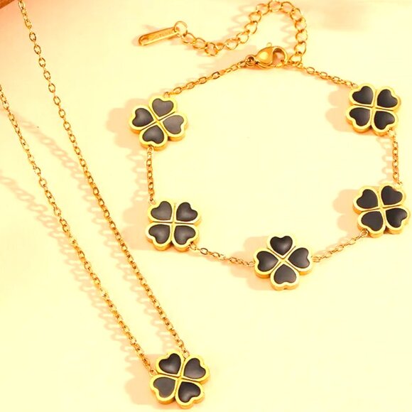 SINGLE BLACK ENAMEL AND GOLD CLOVER NECKLACE AND MULTI CLOVER BRACELET SET - Picture 1 of 1